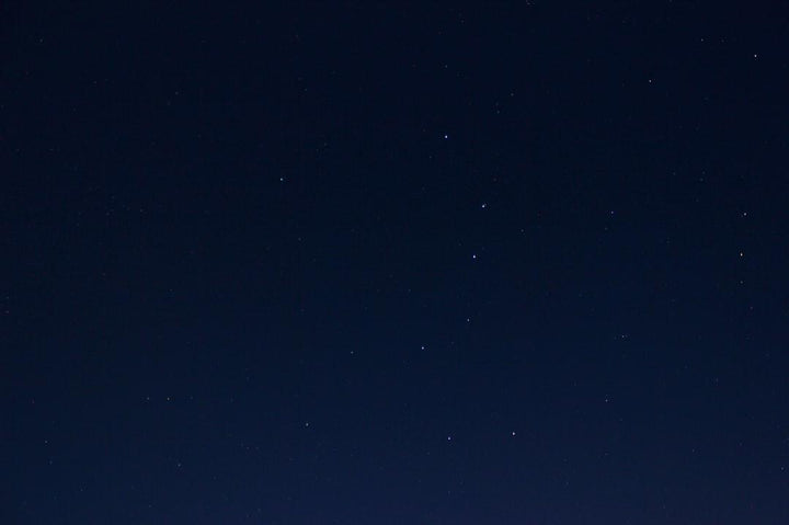 Clear night sky with faint stars, All Angles Creatures homepage visual atmosphere