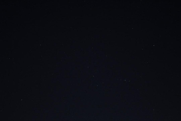 Clear dark night sky with visible stars, All Angles Creatures atmospheric theme