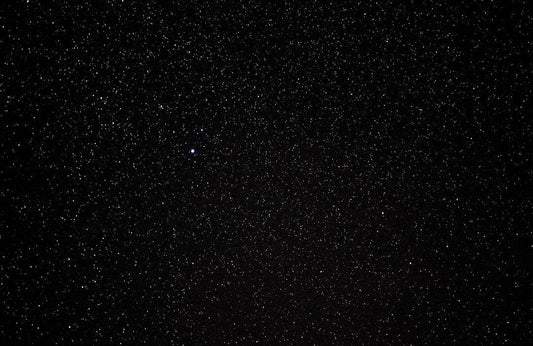 A starry night sky with countless visible stars, illustrating the vast benefits of dried black soldier fly in pet nutrition akin to expansive possibilities.