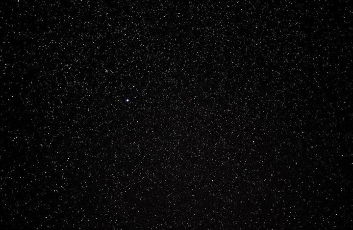 Clear night sky filled with stars, black background, All Angles Creatures homepage visual