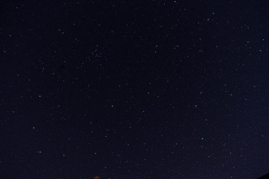 A starry night sky, illustrating a serene environment possibly related to the habitat or ecosystem for black soldier flies.