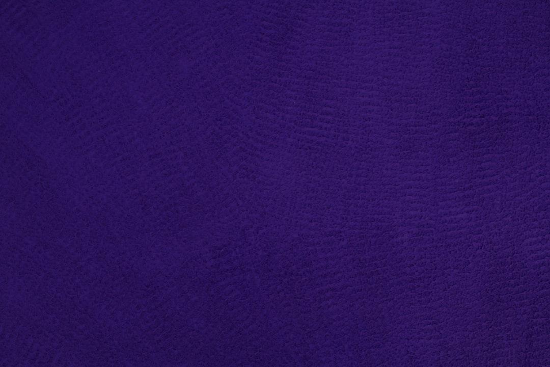 A textured blue background representing the vibrant hue associated with blue powder isopods in the context of pet care.
